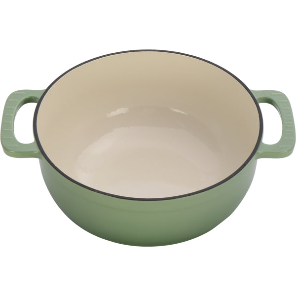 Sage green Dutch oven, lid off, cream enamel interior