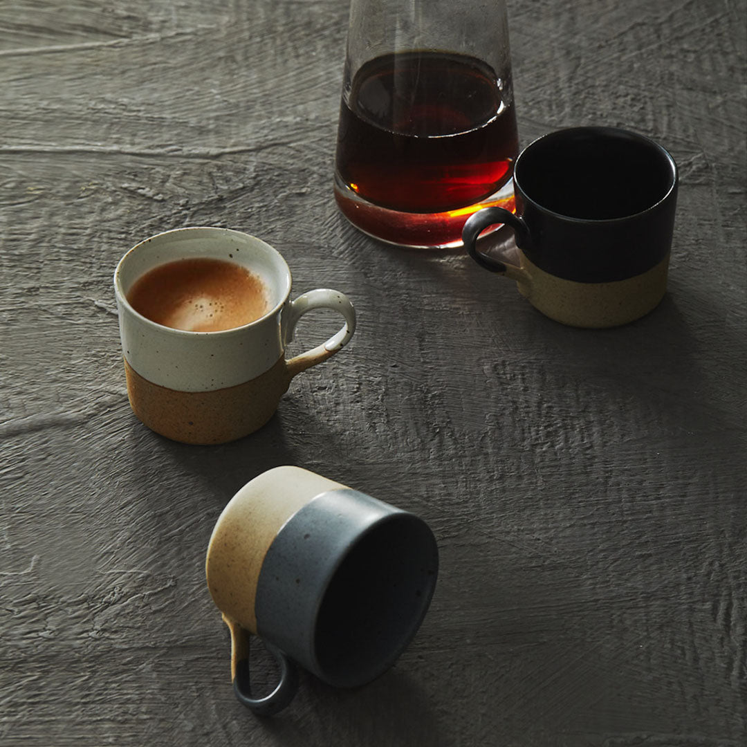 Raw-foot speckled clay mug