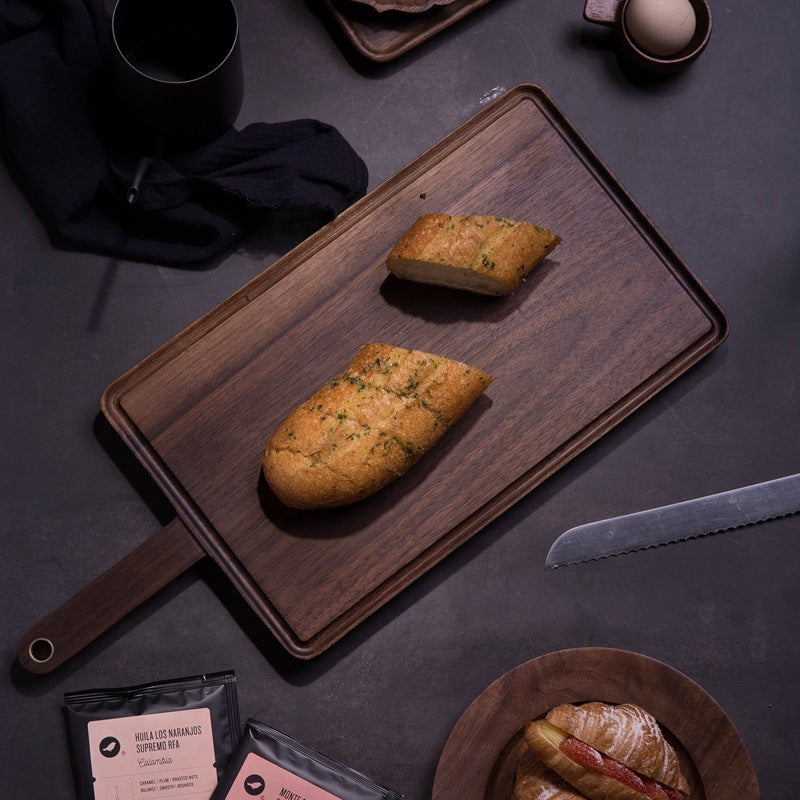 Wooden bread board with handle