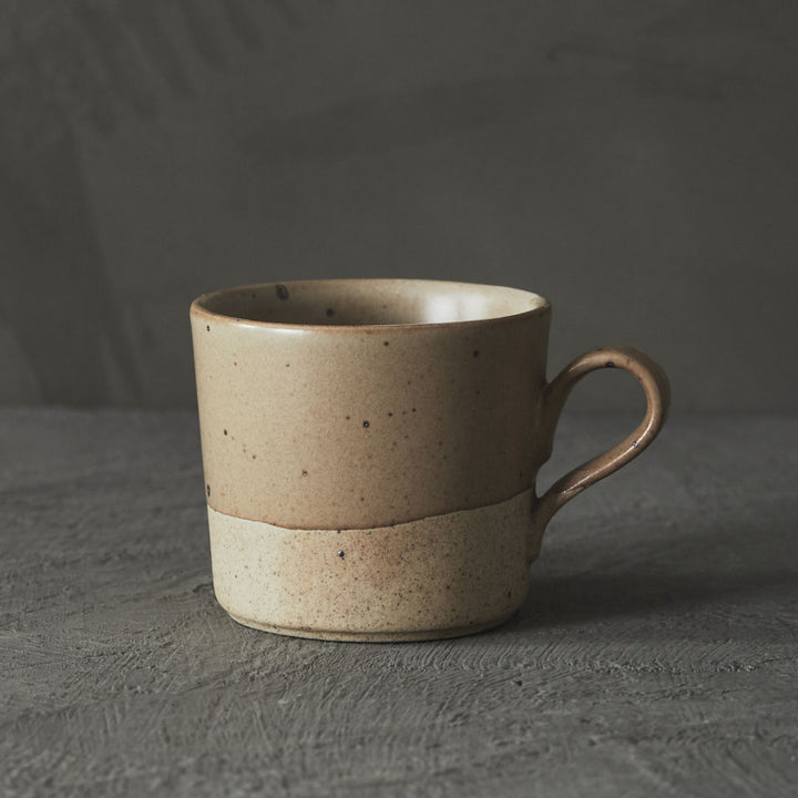 Raw-foot speckled clay mug