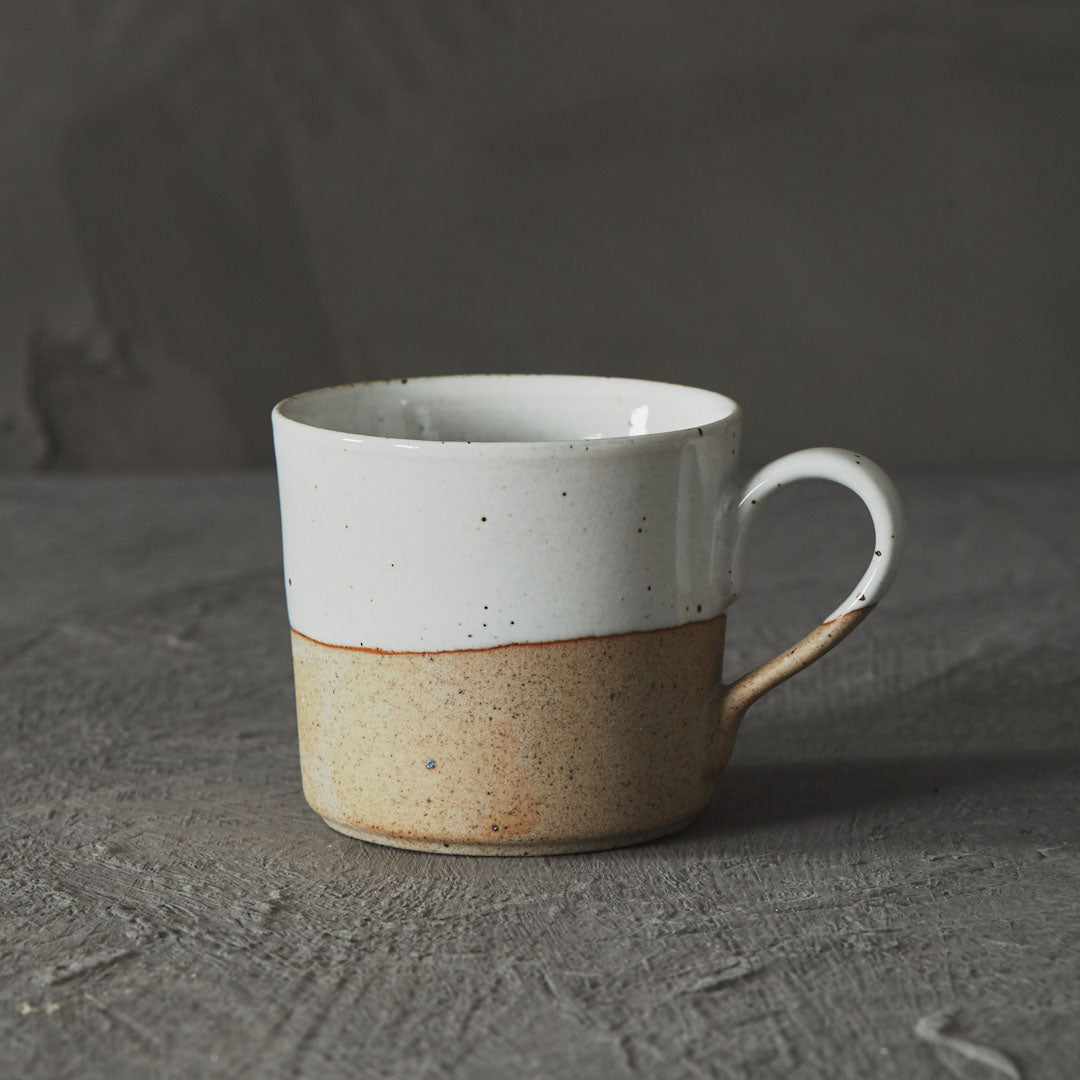 Raw-foot speckled clay mug