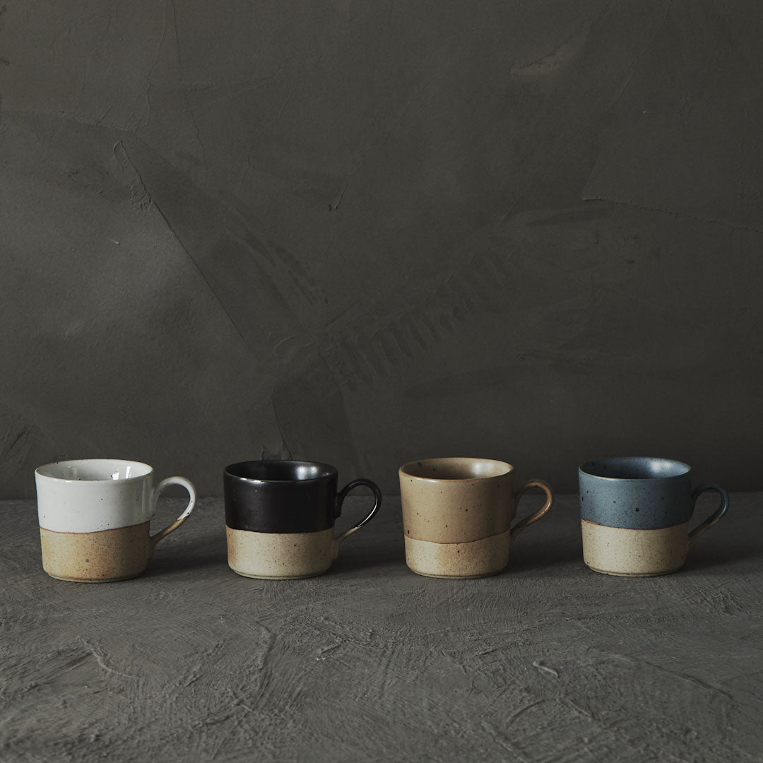 Raw-foot speckled clay mug