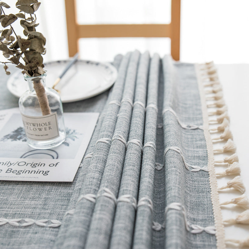 Striped tablecloth with tassels