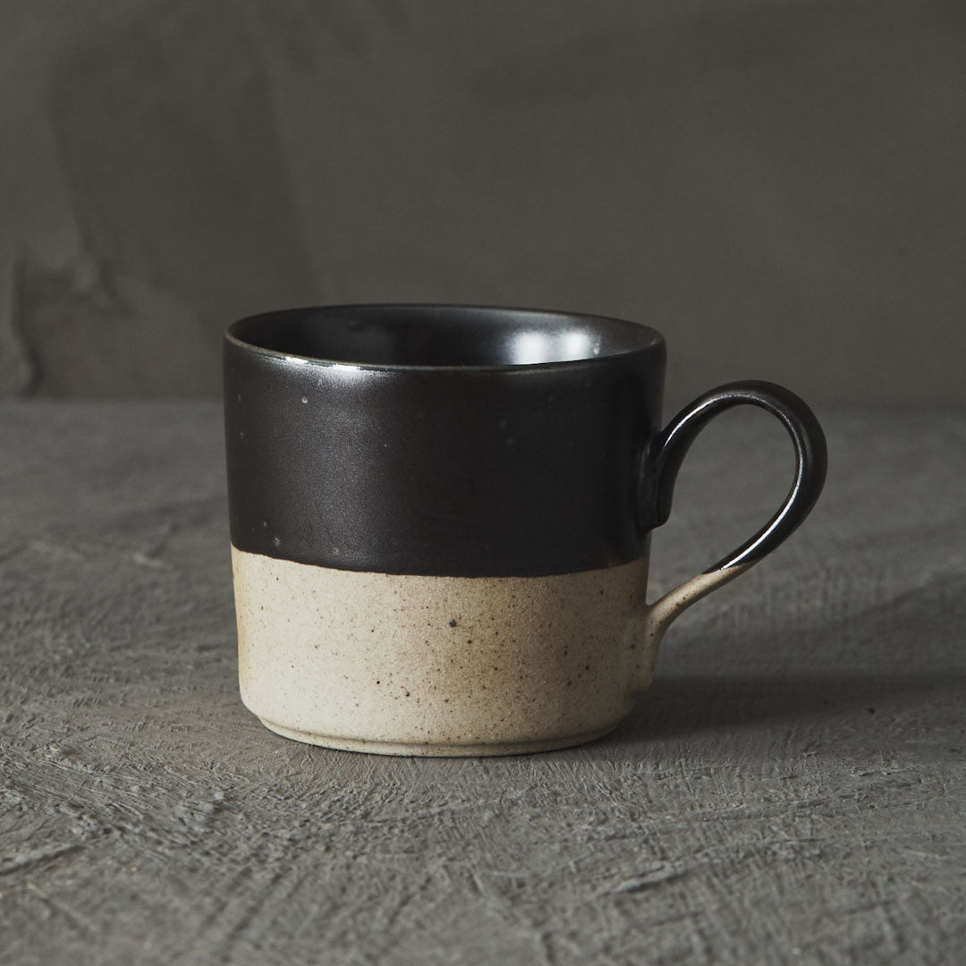 Raw-foot speckled clay mug