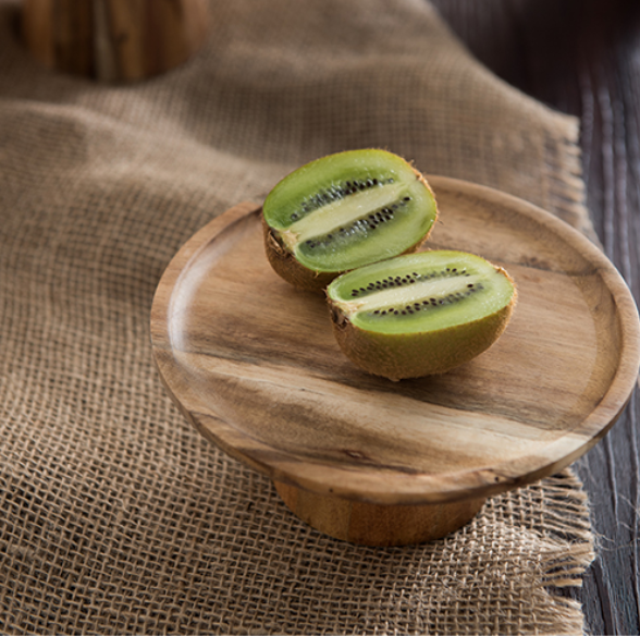 Footed wood cake stand