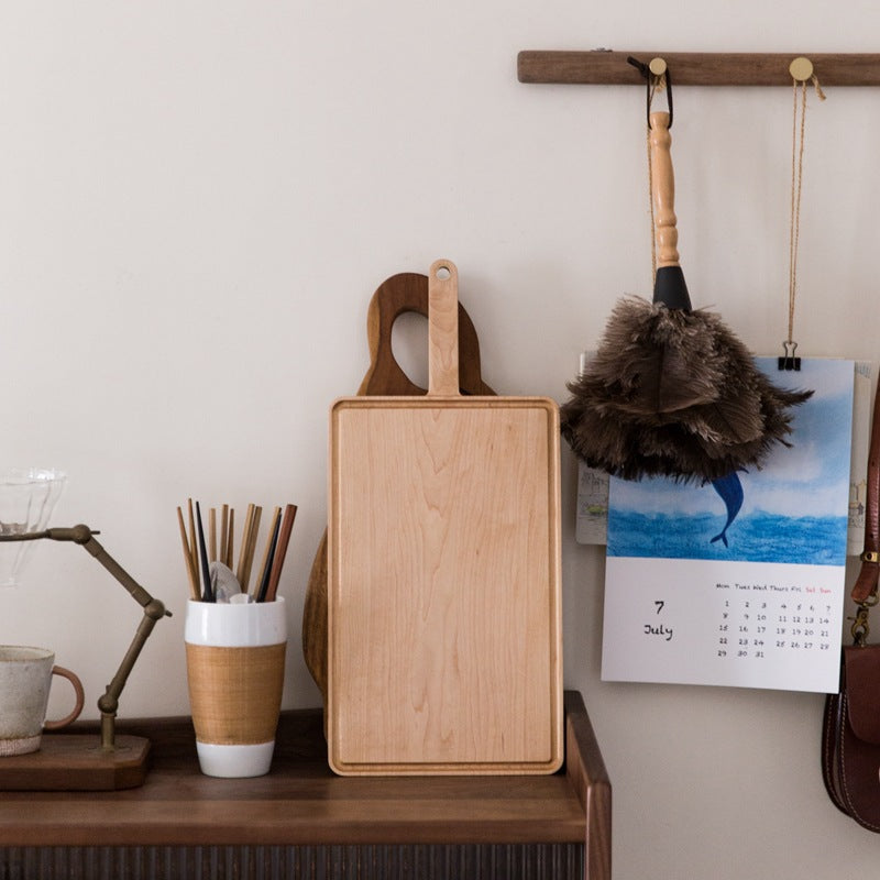 Wooden bread board with handle