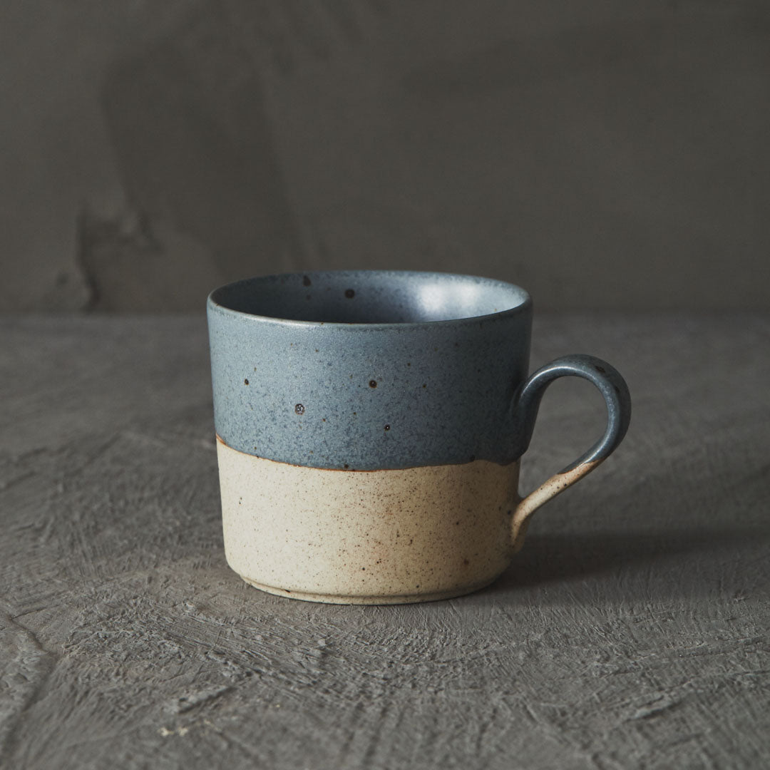 Raw-foot speckled clay mug